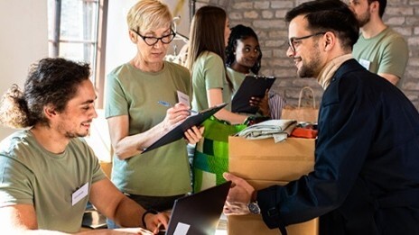 Dropping off donations at a nonprofit event
