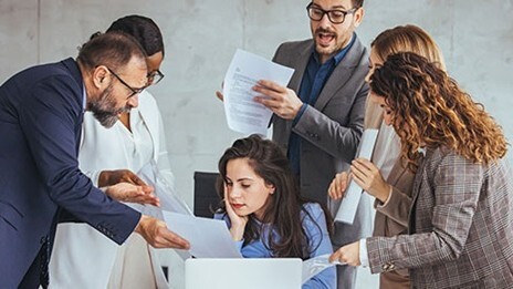 Manager in the center of multiple demands for attention